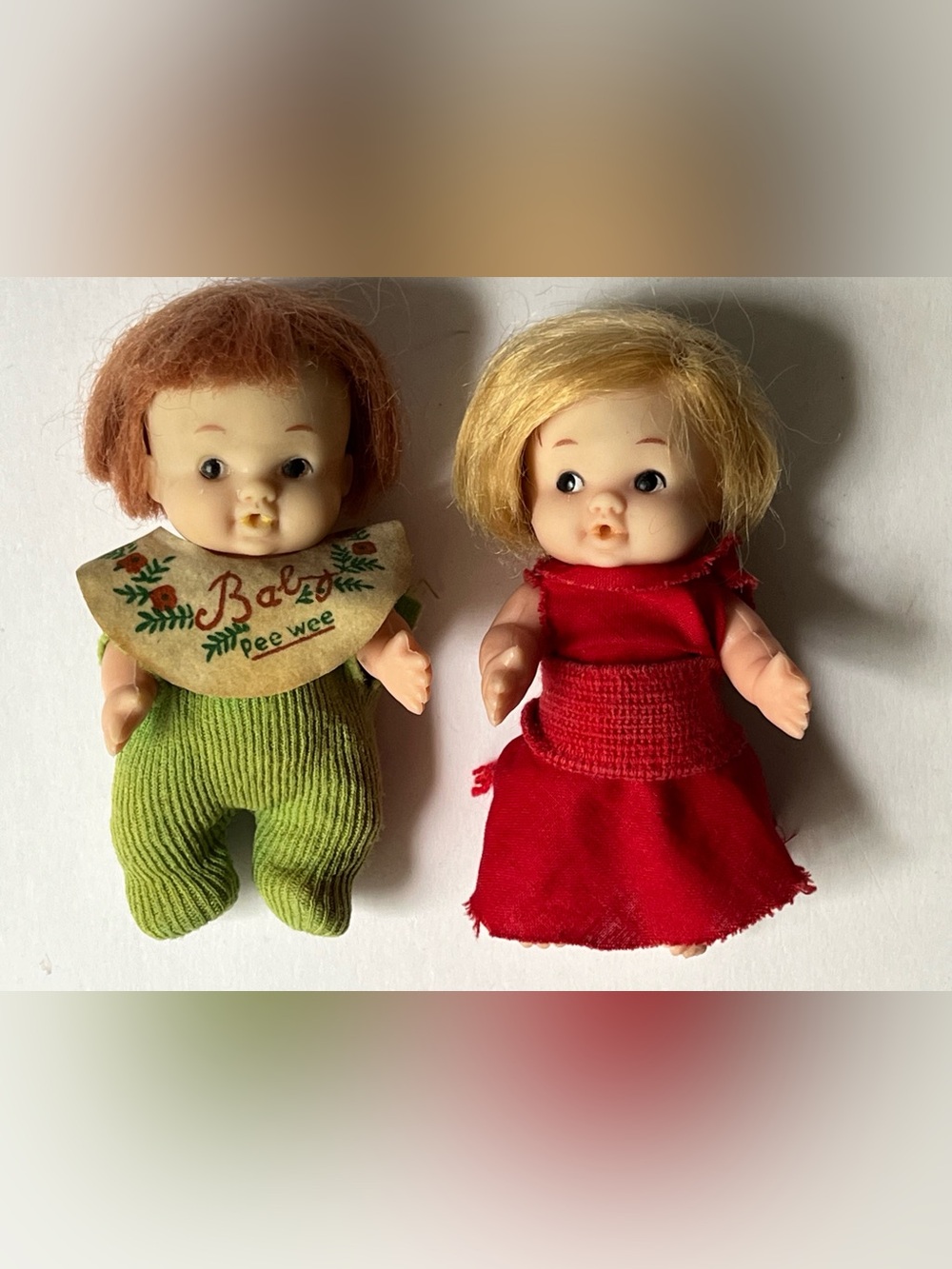 Pee Wee Baby Doll Set — Red Dress Blonde Doll & Green Outfit Doll, 1967.